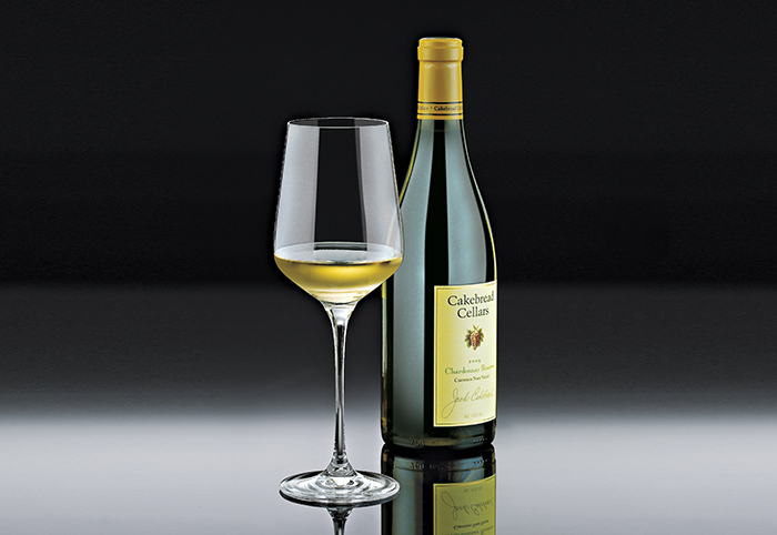 wine enthusiast fusion infinity break resistant chardonnay wine glass with a bottle